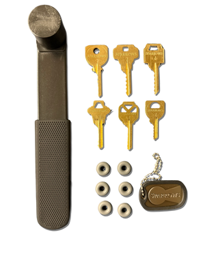 black bump hammer with brass bump keys and blackish rubber washers.